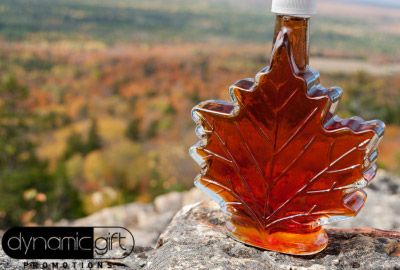 Custom gourmet gift ideas in Canada from Dynamic Gift with a maple syrup bottle shaped like a maple leaf. 