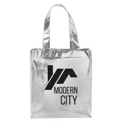 A silver colour custom printed metallic gift tote that has a black logo on the front.