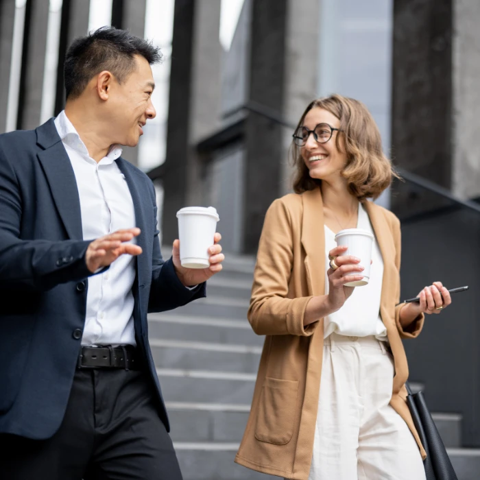 Two people talking on their lunch break in the city.