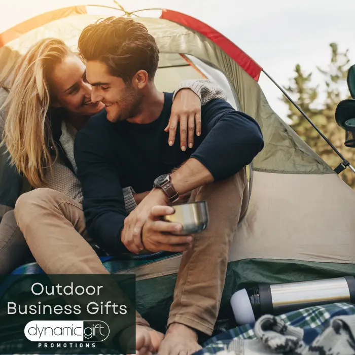 Two people celebrate fall camping with outdoor business gifts from Dynamic Gift Canada.