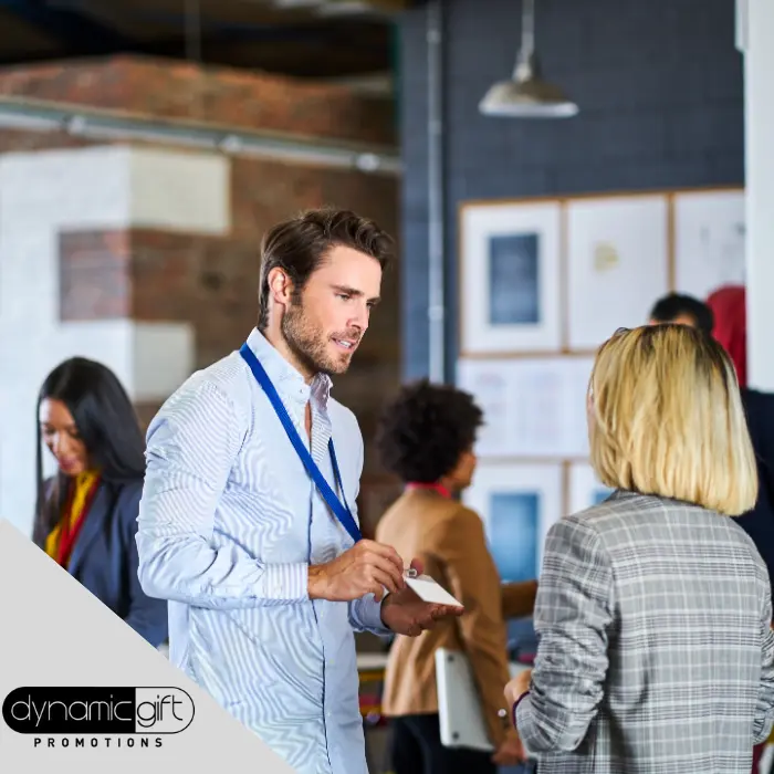 Networking people at a tradeshow in Canada wearing lanyards for ID displays.